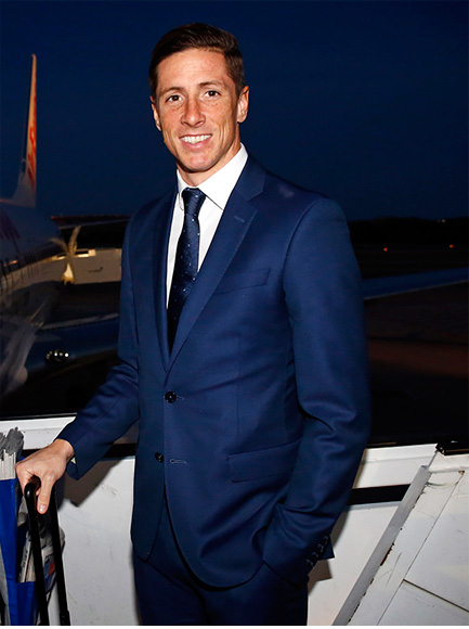 Forward Fernando Torres wearing a Roberto Verino suit