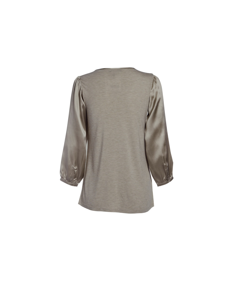 Blusa visón escote redondo y bolsillo
