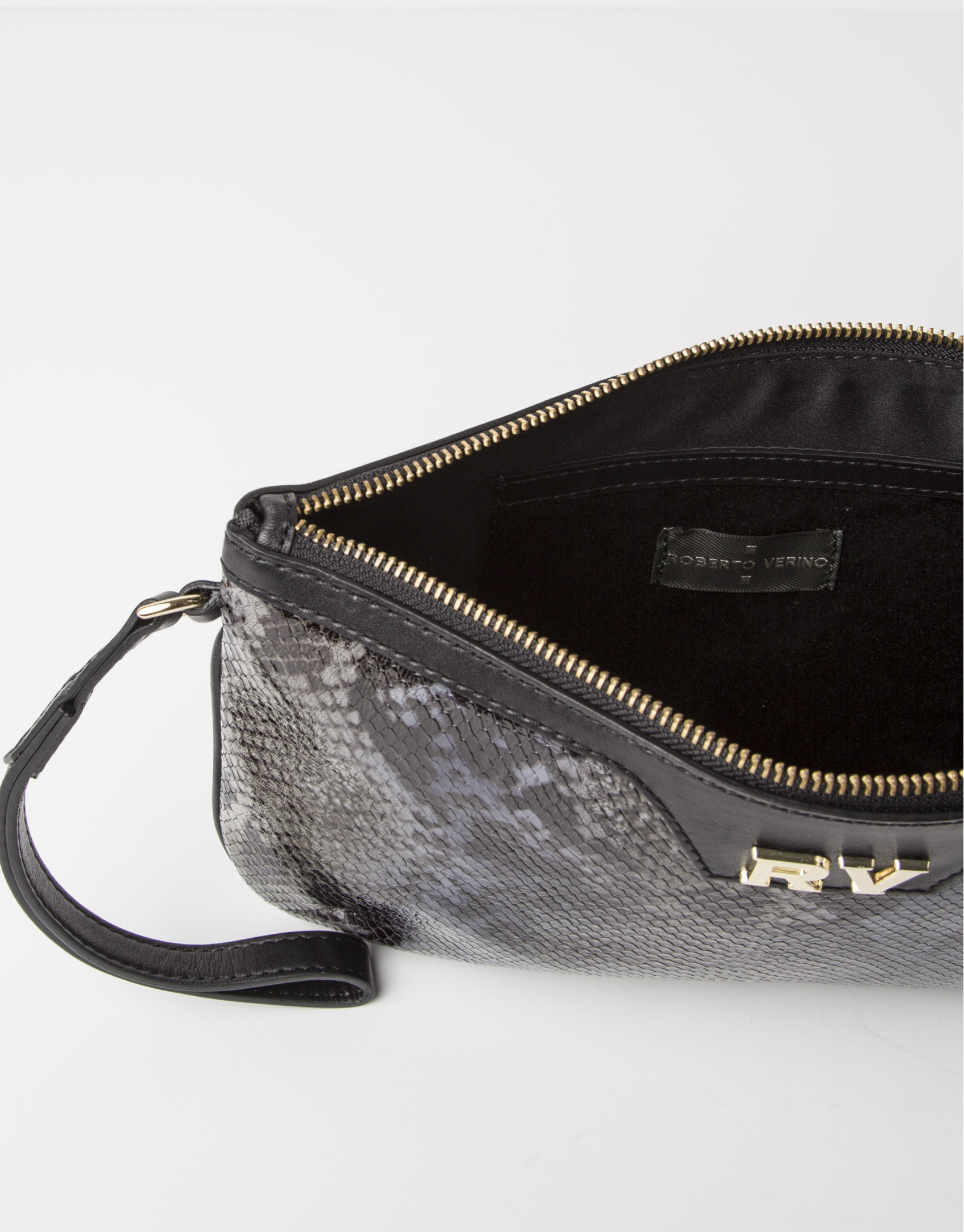 Clutch en piel vacuno