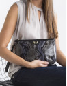 Clutch en piel vacuno