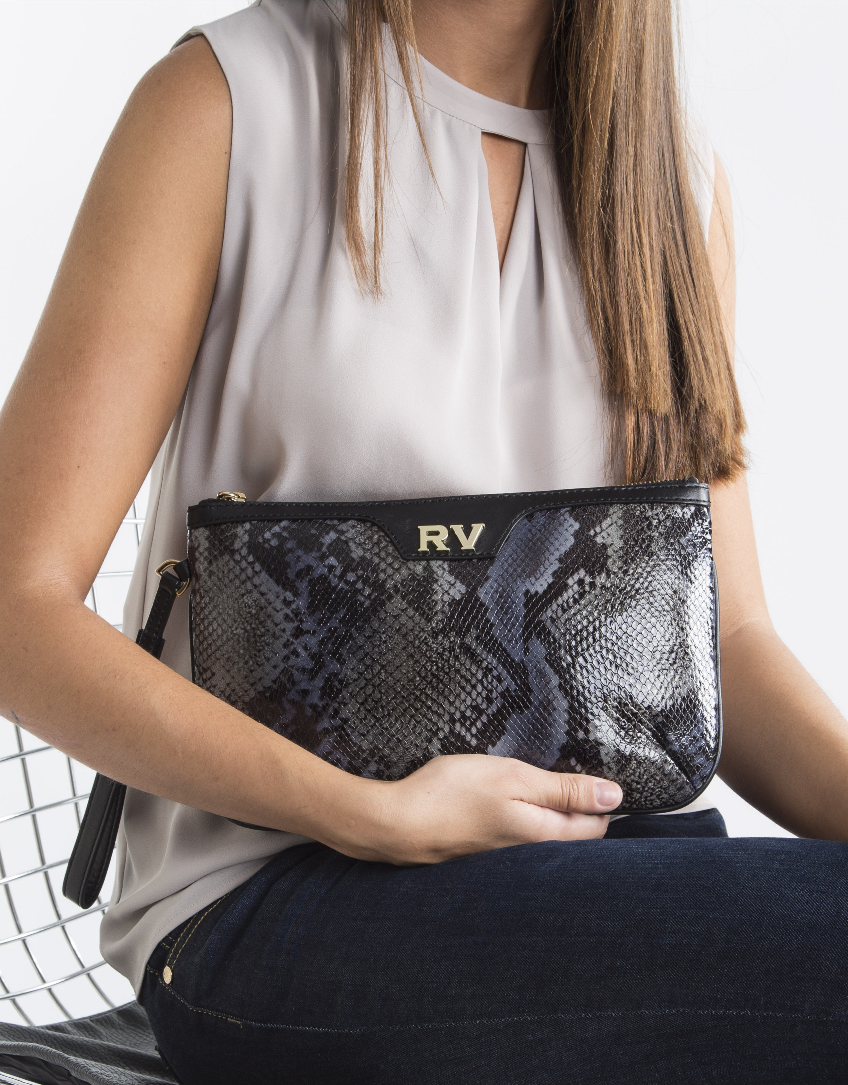 Clutch en piel vacuno