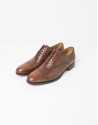Brown Oxford dress shoes