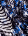 Combined print and striped scarf