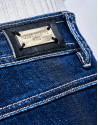 Pantalón denim pitillo tiro alto