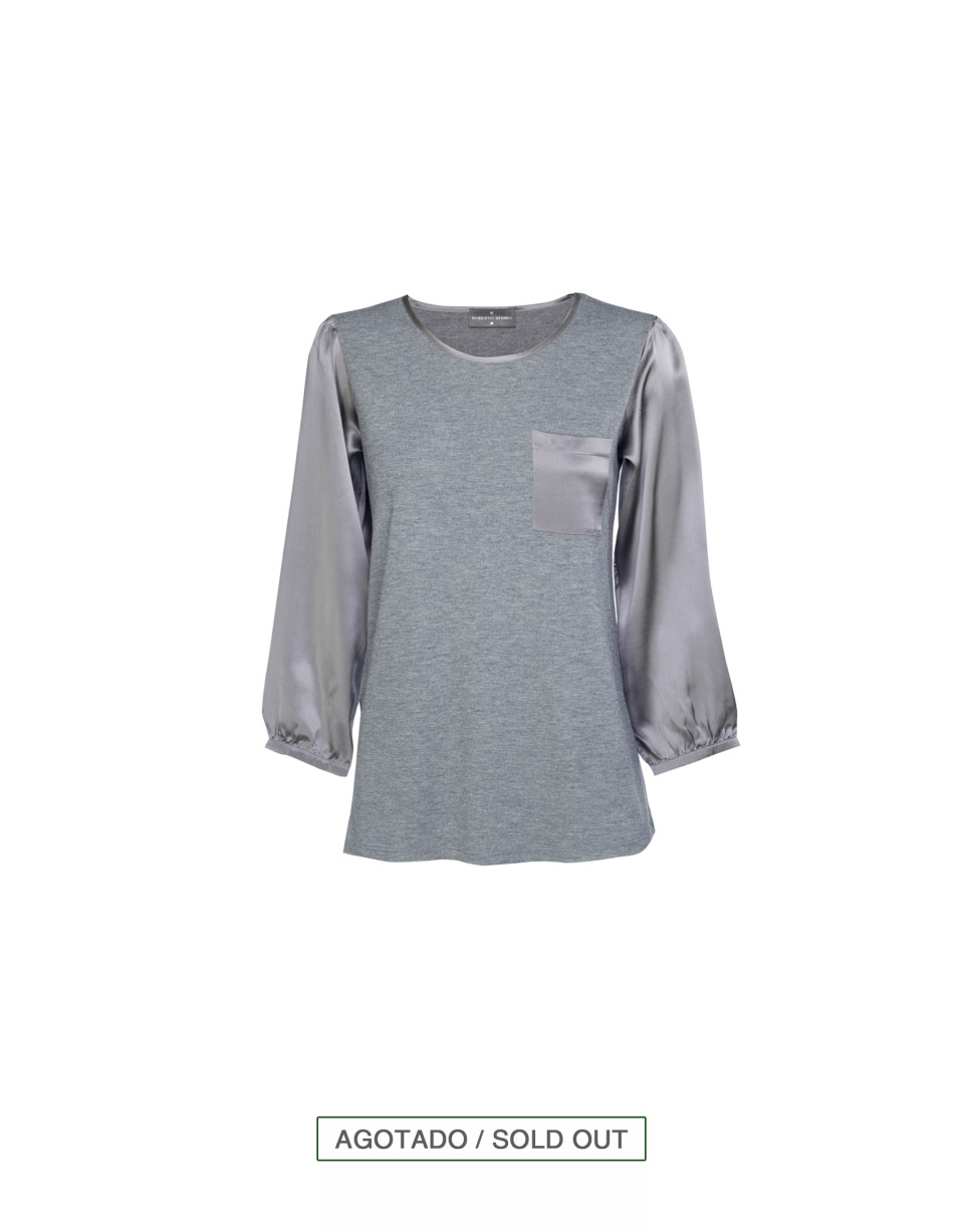 Blusa gris escote redondo y bolsillo