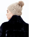 Beige knit cap with pompom