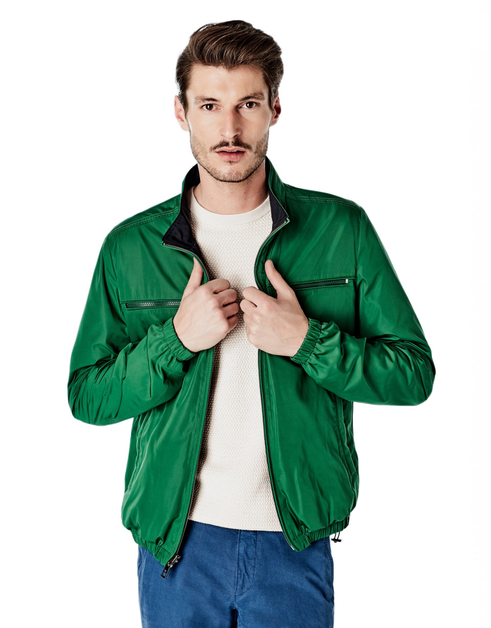 Green and navy blue reversible windbreaker