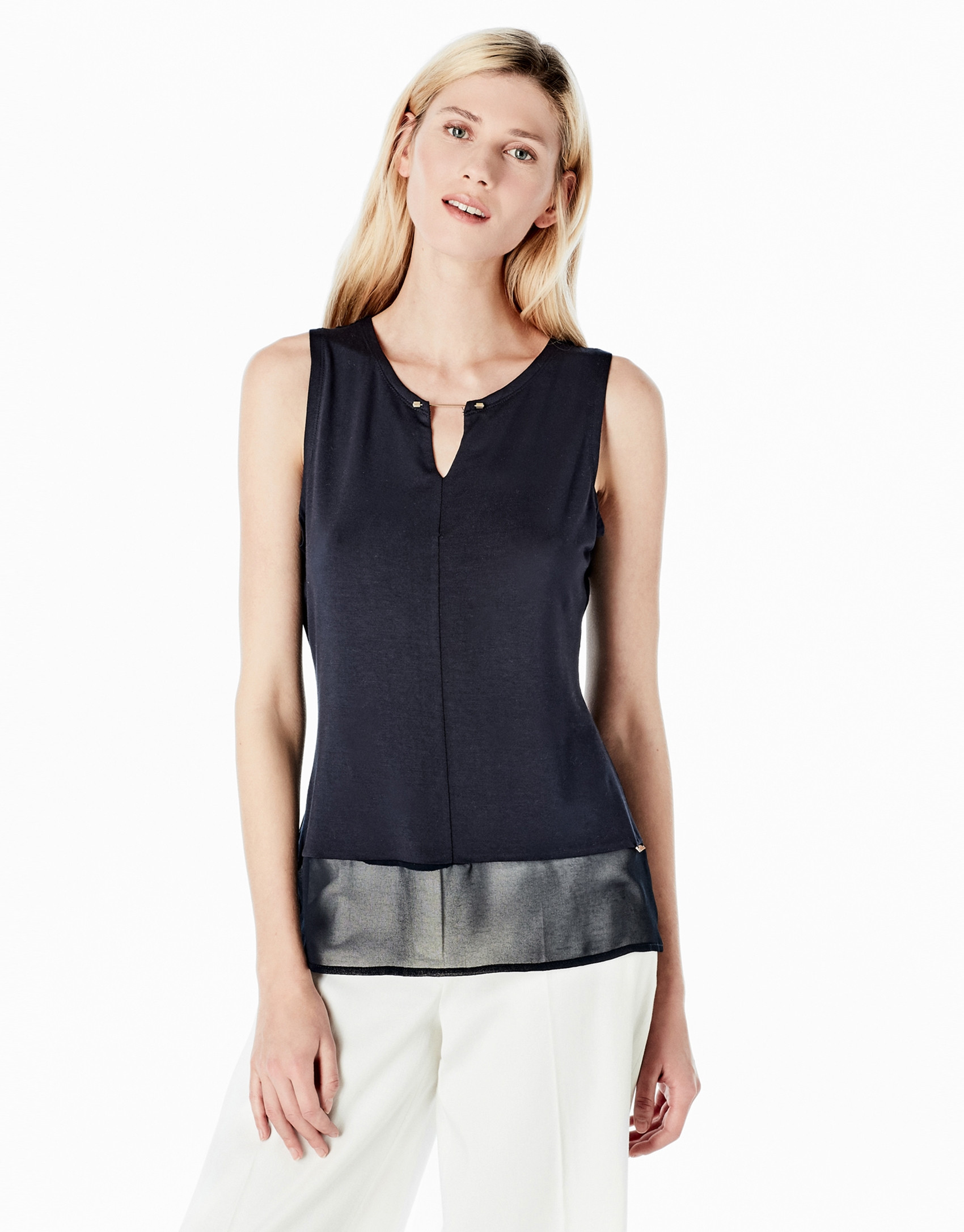 Blue top with tie pin