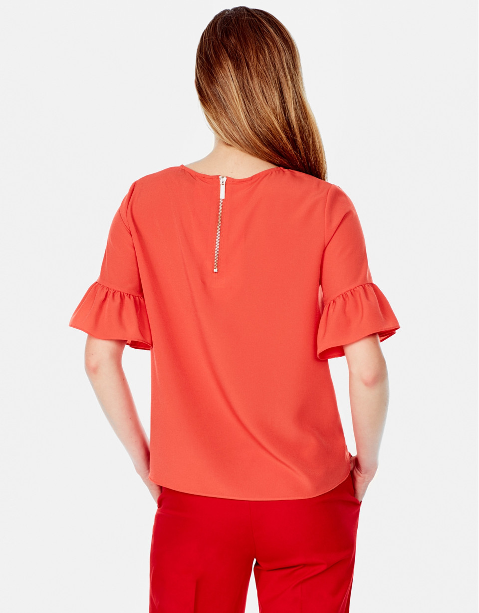Top manga volante naranja