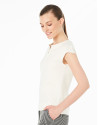 Camiseta sin mangas crema