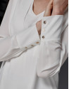 Blusa amplia escote pico crudo