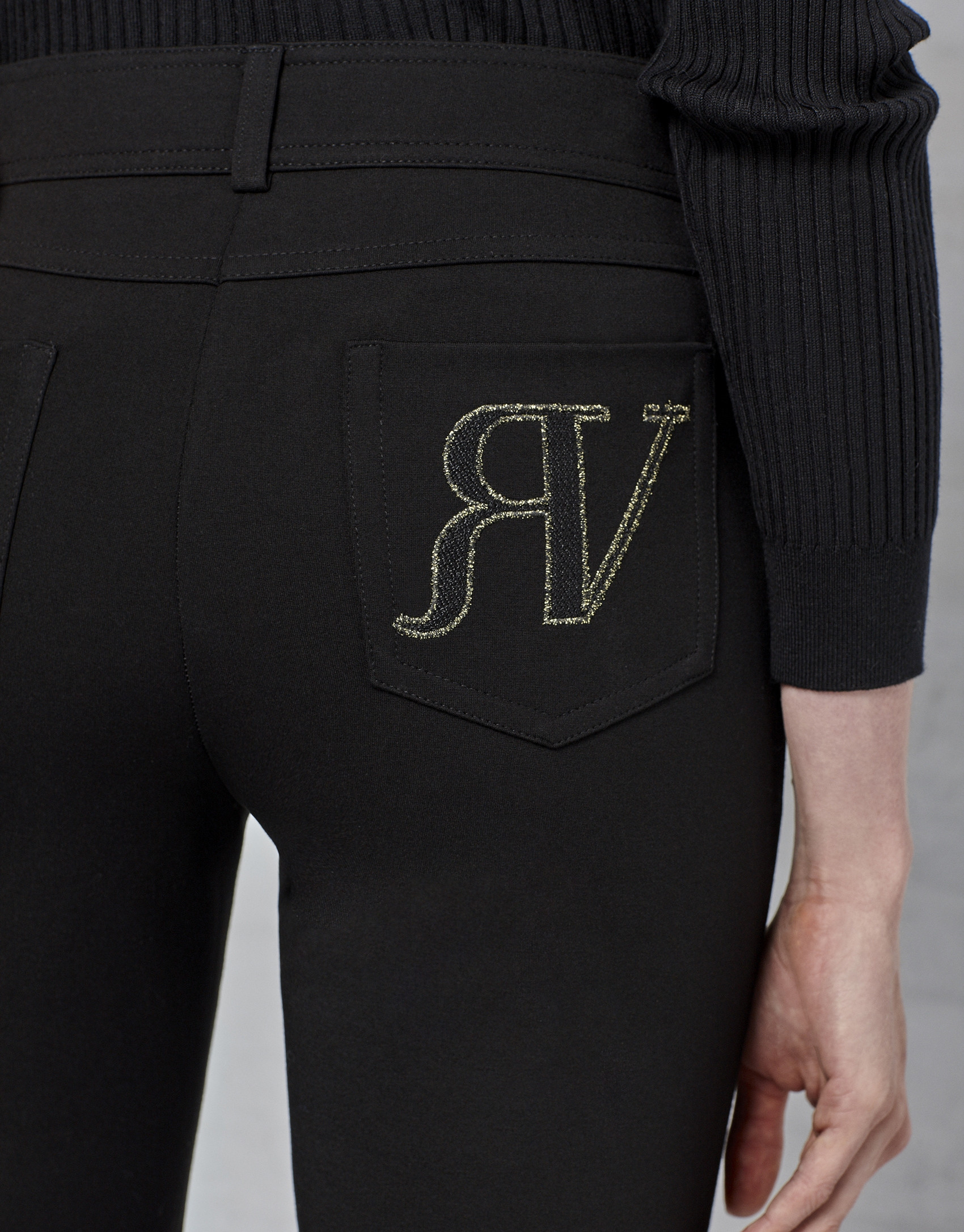 Black pants with five pockets