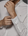 White shirt with brown microprint