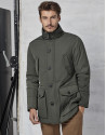 Parka color kaki con capucha y pelo