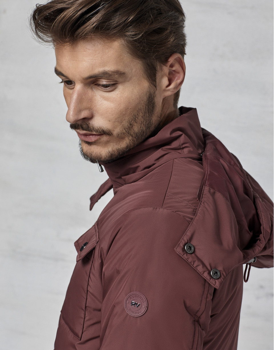 Maroon windbreaker with hood and fur collar