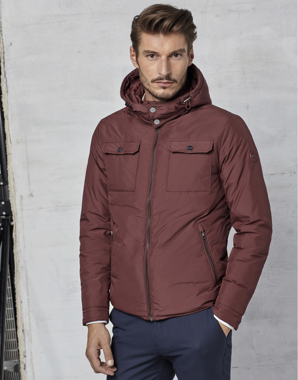 Maroon windbreaker with hood and fur collar