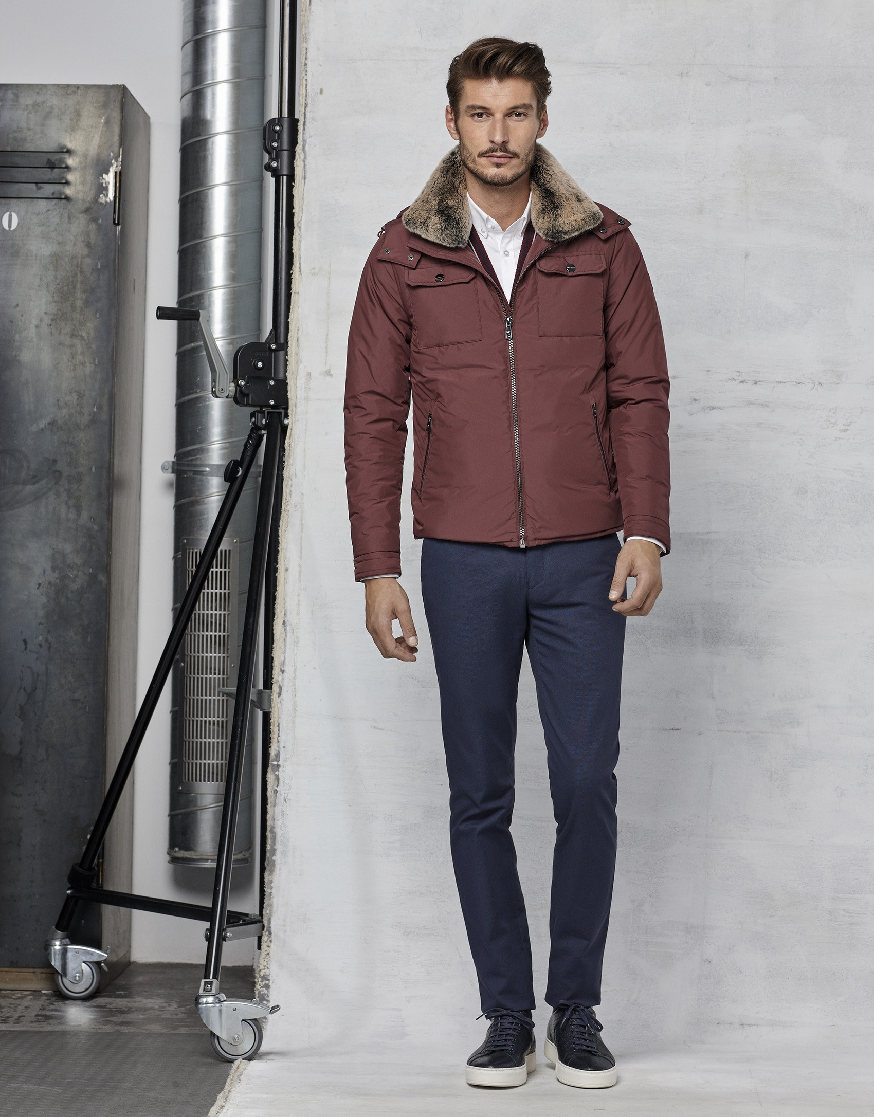 Maroon windbreaker with hood and fur collar