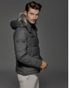 Grey windbreaker with hood and fur collar