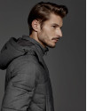 Grey windbreaker with hood and fur collar