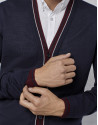Navy blue cardigan with maroon and ivory contrasts