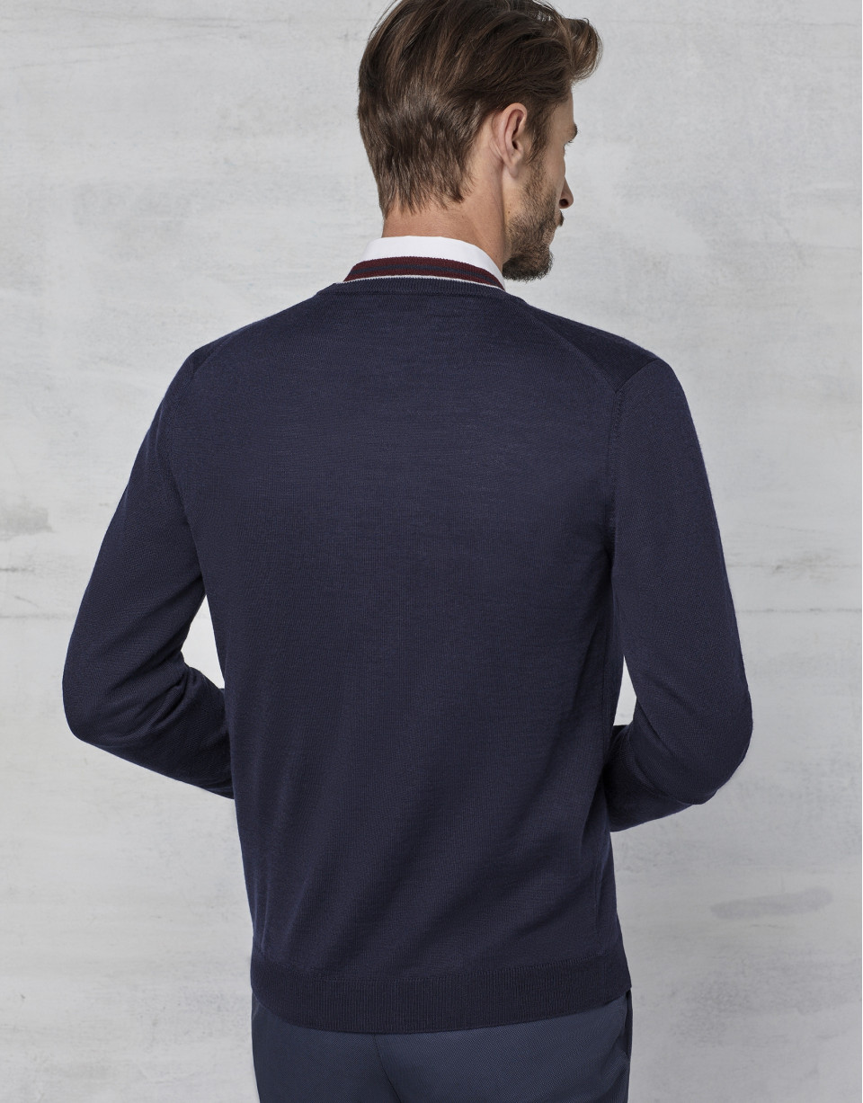 Navy blue cardigan with maroon and ivory contrasts