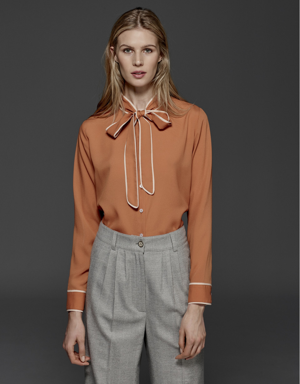 Orange shirt with bow collar