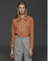 Orange shirt with bow collar