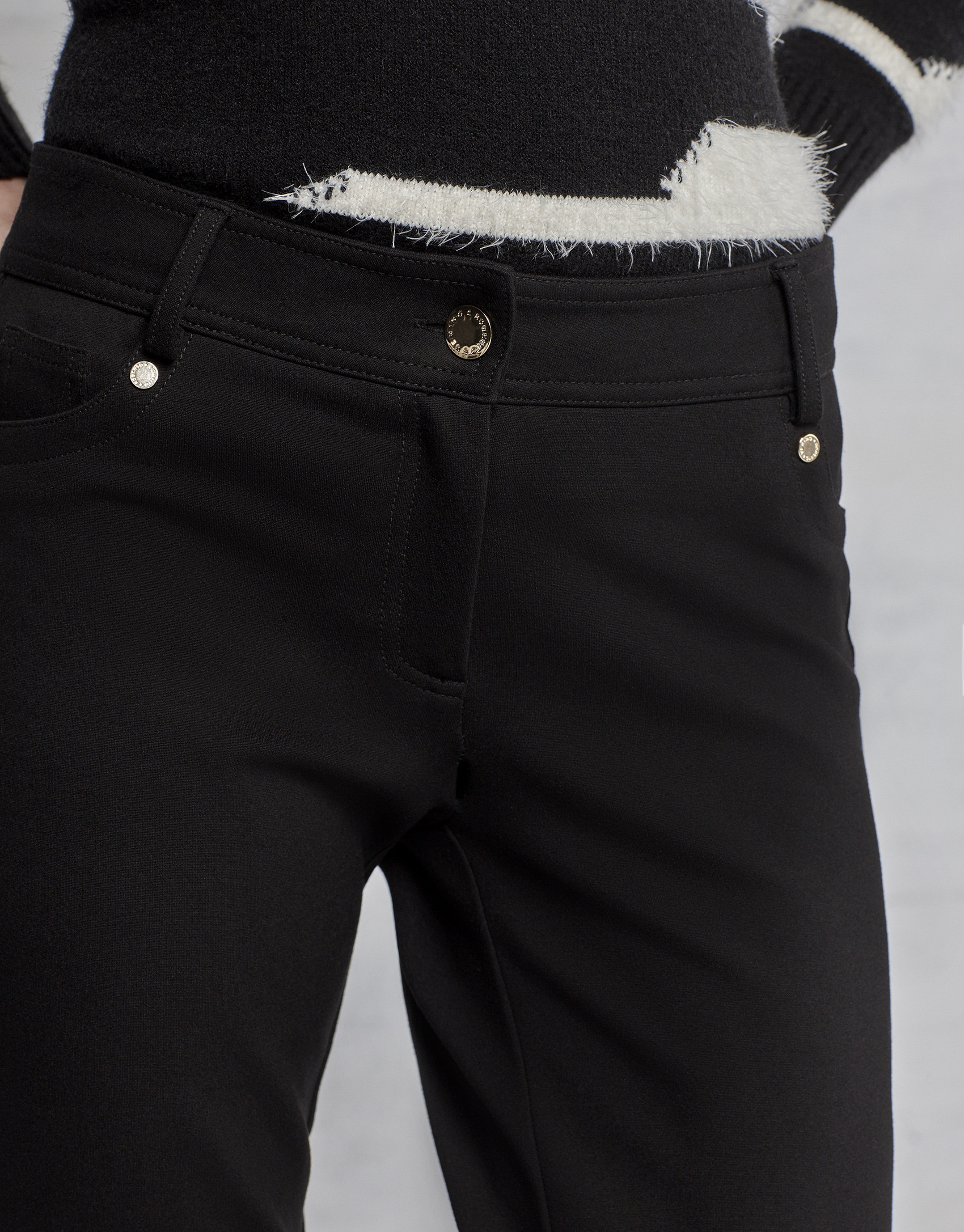 Black pants with five pockets