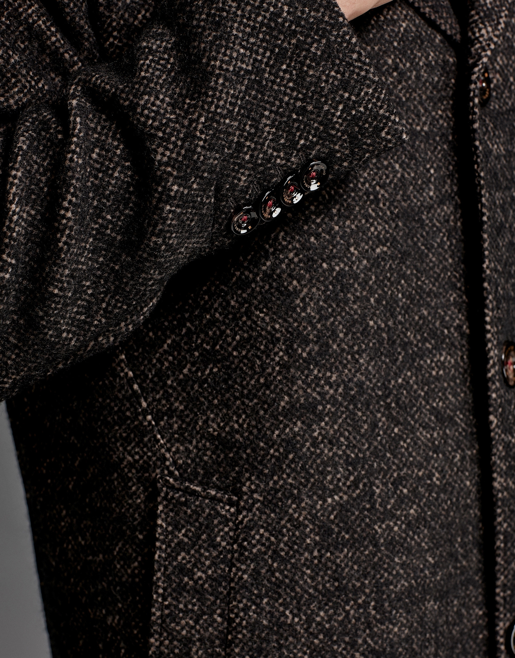 Black and tan wool coat with classic, straight cut
