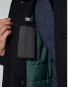 Parka azul marino con capucha y pelo