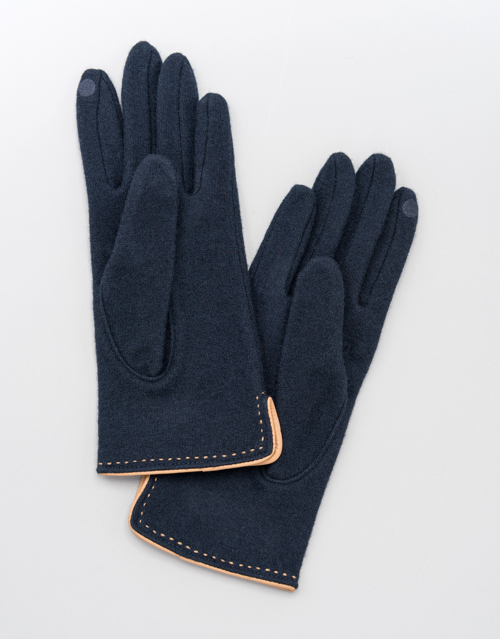 Blue knit gloves with beige leather trim