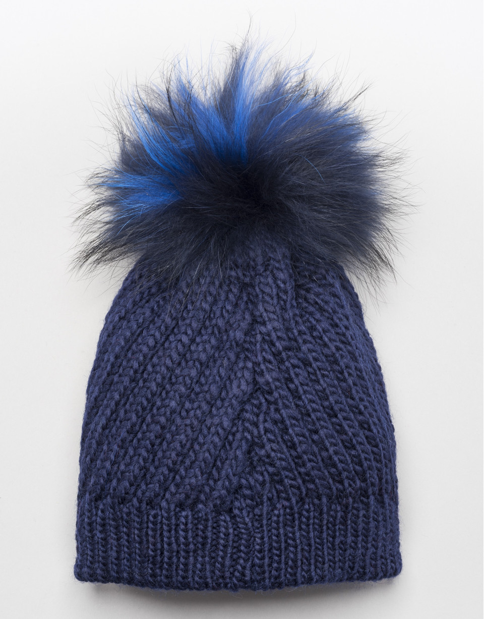 Blue cable knit wool cap with pompom