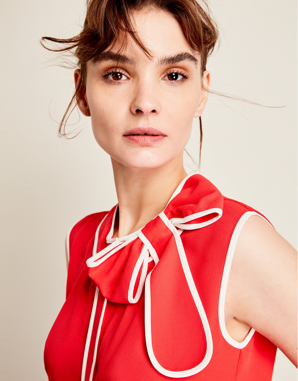 Red top with bow