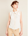 Beige top with bow