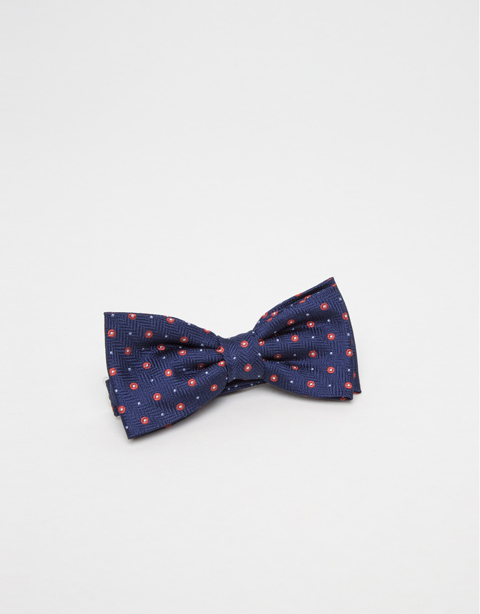 Navy blue jacquard bowtie with red polka dots