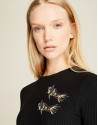 Camiseta negra peces