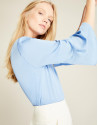 Top azul mangas con volantes