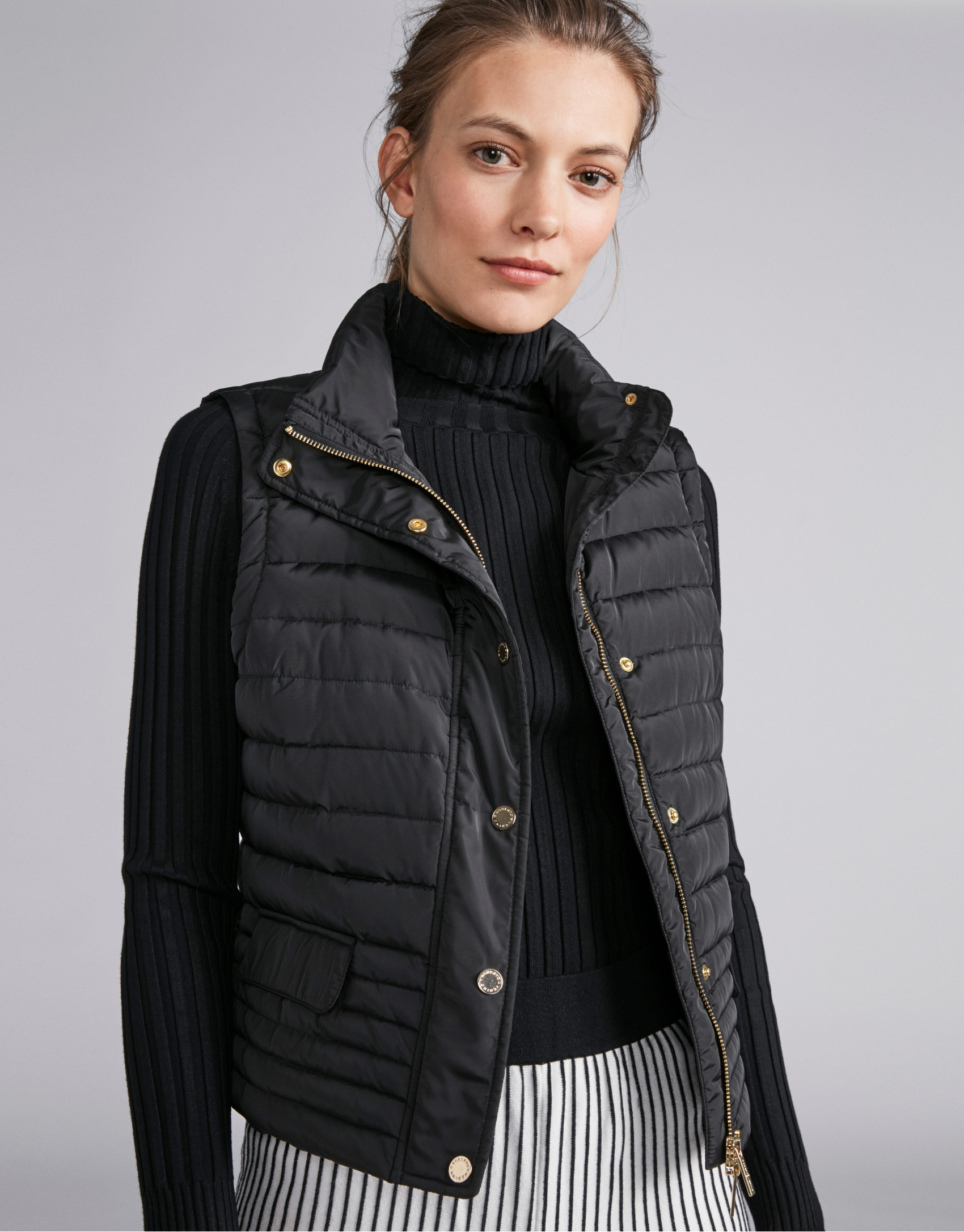Black quilted vest