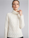 White sweater with stovepipe collar and decoration