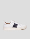 White sports shoes with side panels