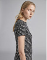 Black top with signature print