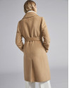 Beige cloth coat with triple row of  buttons