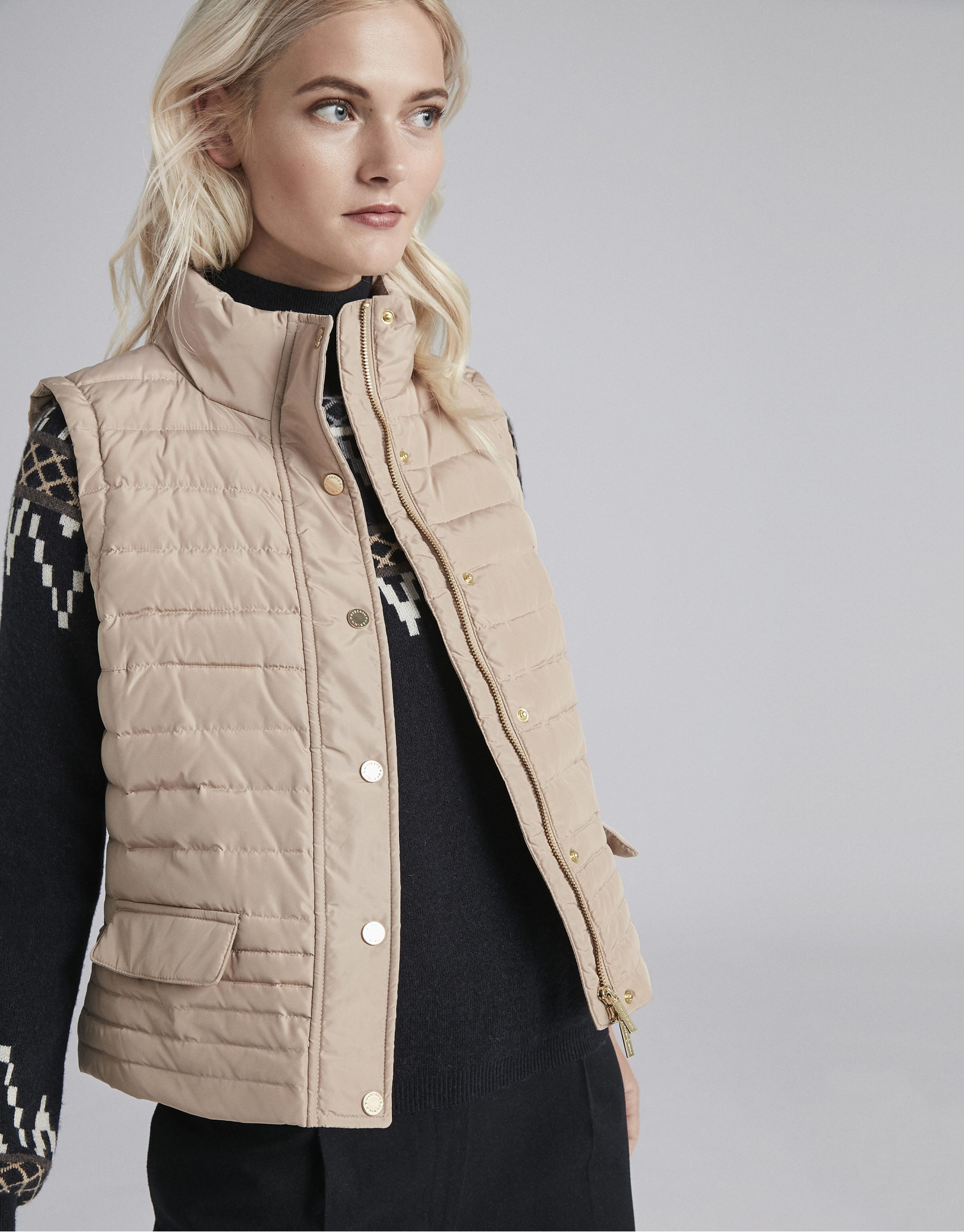 Beige quilted vest