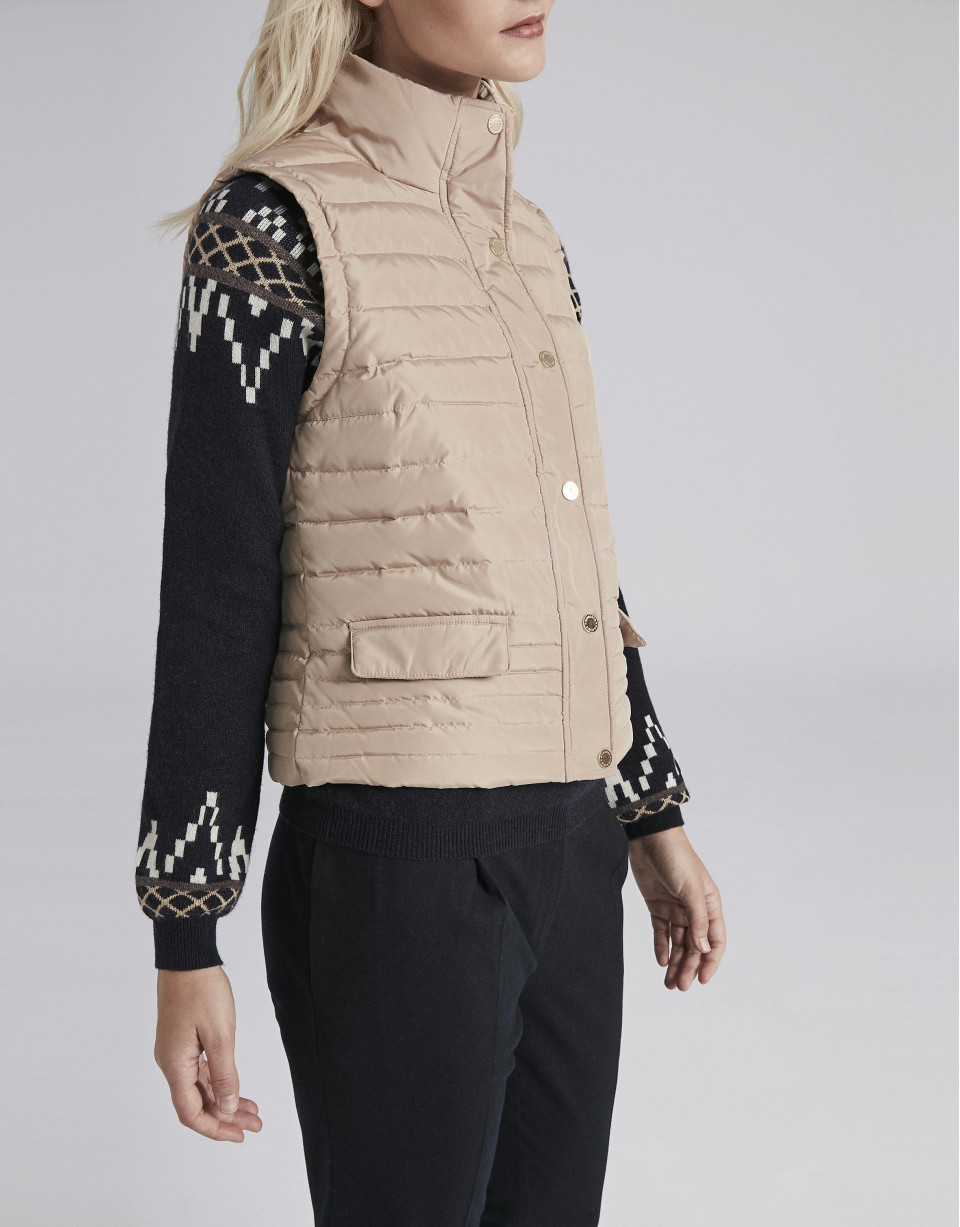 Beige quilted vest