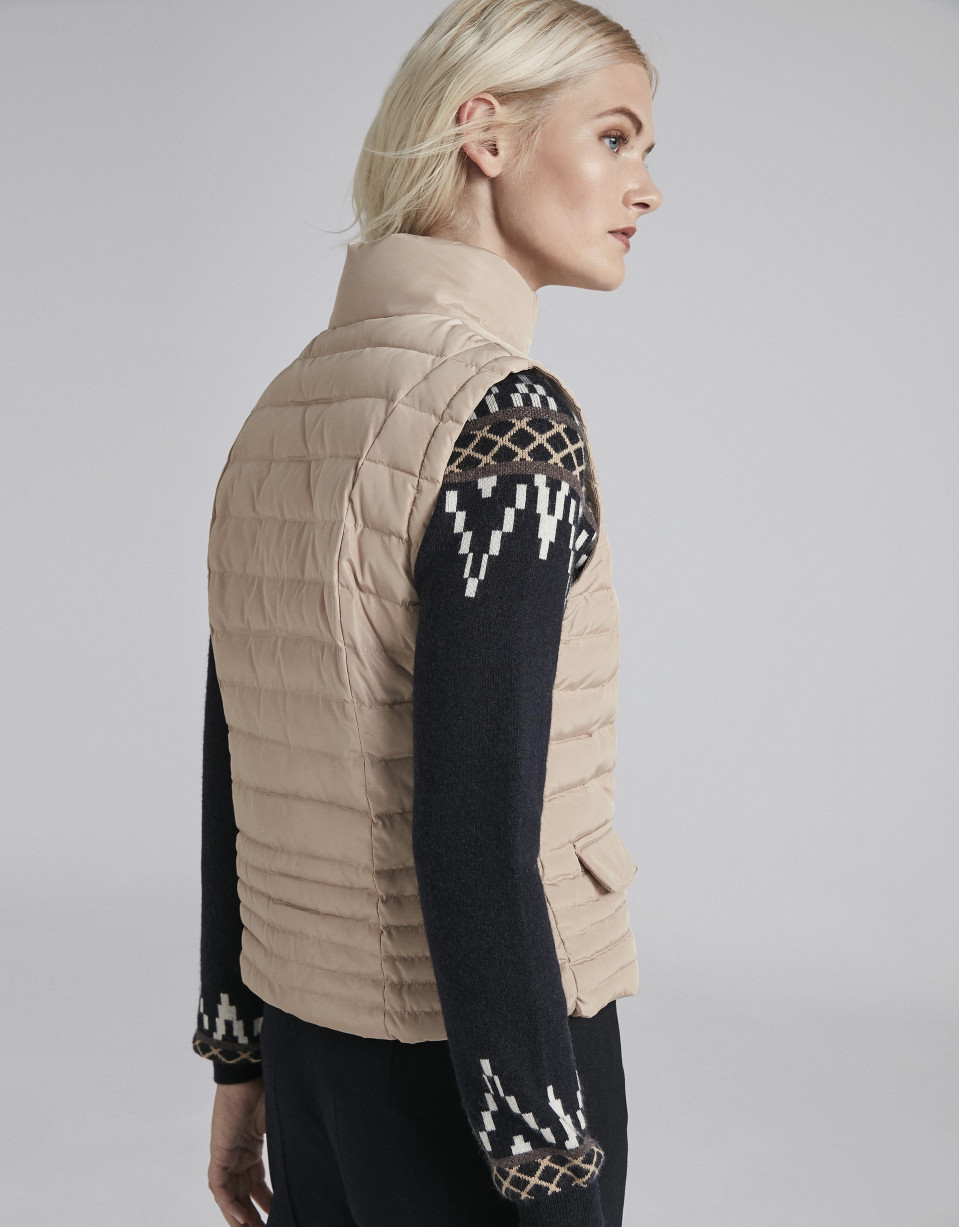 Beige quilted vest