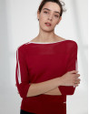Red sweater with bat sleeves