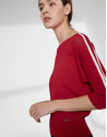 Red sweater with bat sleeves