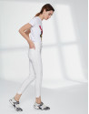 Beige cigarette pants with irregular hem