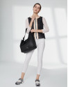 Black quilted vest with contrasting beige