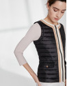 Black quilted vest with contrasting beige